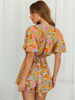 Load image into Gallery viewer, Floral Wrap Tie Romper
